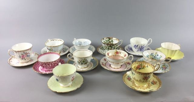 Lot of 12 Bone China Cups and Saucers: Unmatched cups and saucers including Staffordshire, Ansley, Spode, etc