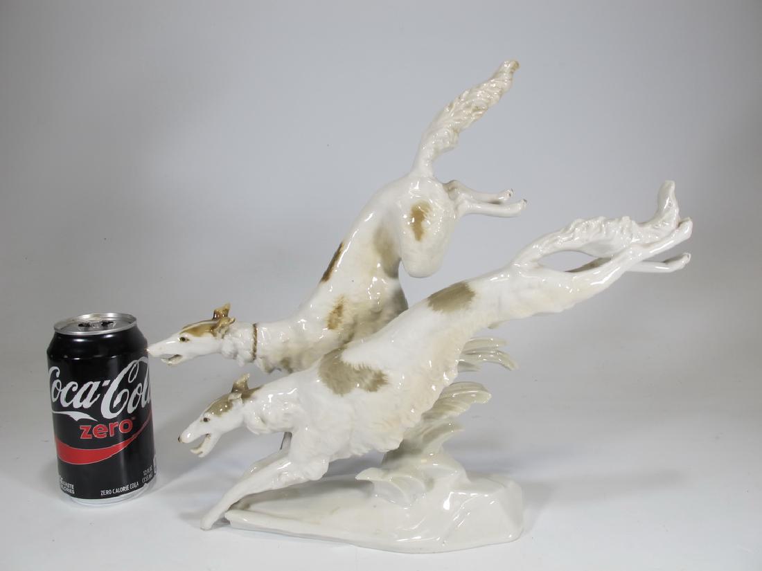 Antique German Hutschenreuther borzoi dogs porcelain: Antique German Hutschenreuther borzoi dogs porcelain statue, marked. 12” H x 13 1/4” W x 3 1/4” D. Shipping in USA or International please contact James Lawrence from the local UPS Store: 954-46