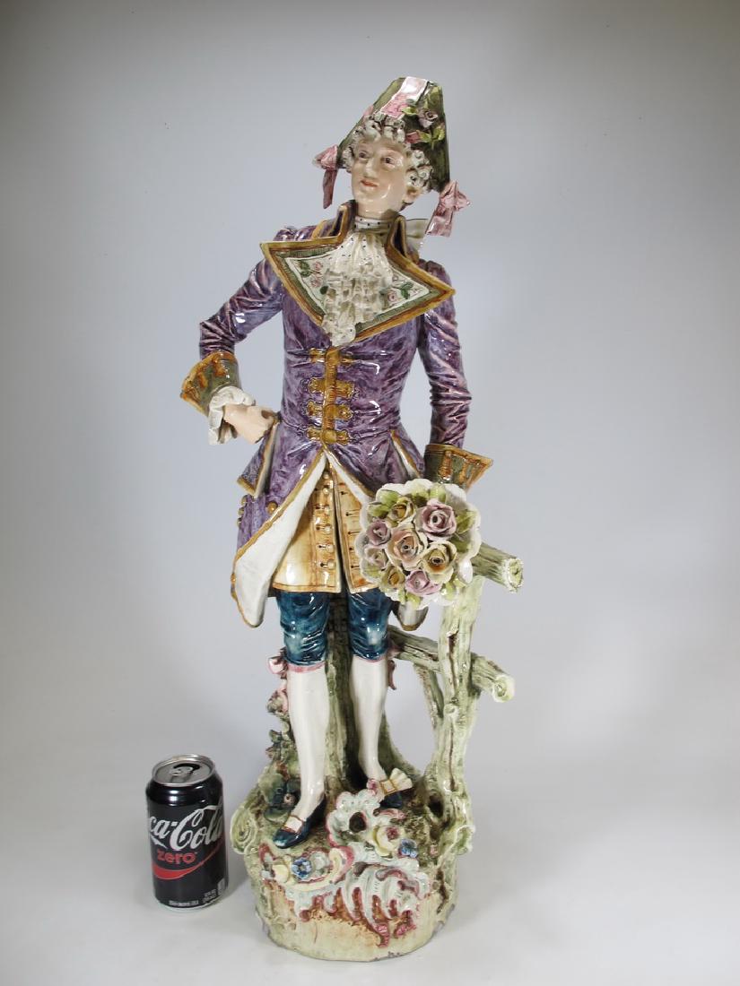 Antique European porcelain man statue: Antique European porcelain man statue. 26 7/8â€ H x 8 1/2â€ W. Shipping in USA or International please contact : James Lawrence from the local UPS Store, 954-463-0444, FloridaUPS@gmail.com, or D