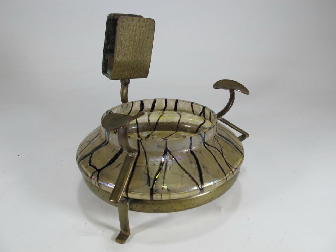 Probably Loetz bronze & glass ashtray: Probably Loetz bronze & glass ashtray. 5 7/8" H x 6" W x 5 1/2" D. Shipping in USA or International please contact : James Lawrence from the local UPS Store, 954-463-0444, FloridaUPS@gmail.com, or Dav
