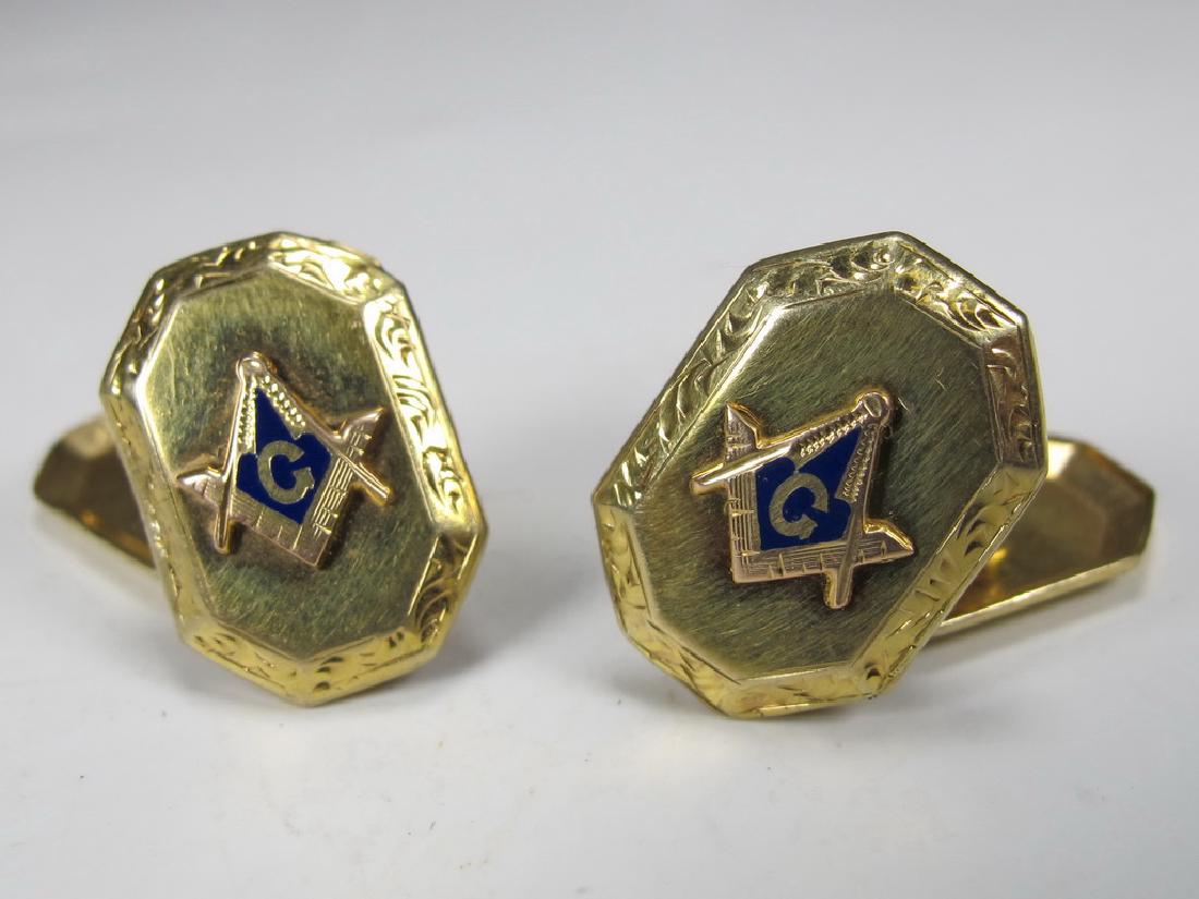 Antique pair of 10 k gold & enamel Masonic cufflinks: Pair of 10K yellow gold cufflinks. Applied red gold and enamel Masonic symbol. 5/8" H x 7/16" W. Shipping in USA or International please contact : James Lawrence from the local UPS Store, 954-463-0444