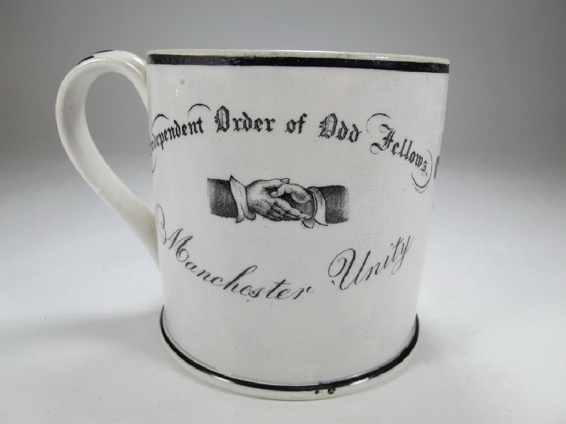 Old English Masonic mug: Old English Masonic mug black transfer Independent Order of Odd Fellows Manchester Unity, Masonic bage and initials T. W. No hallmark. 4" H x 5 1/2" W x 4 1/16" D. Shipping in USA or International ple