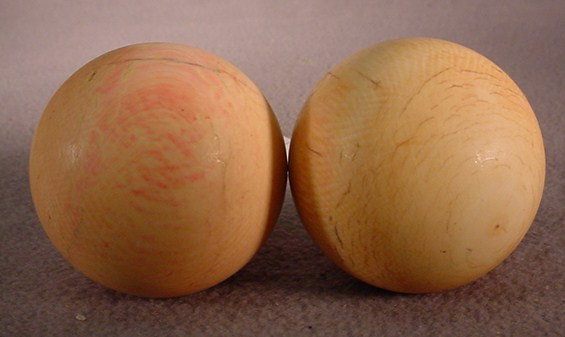 Antique pair of ivory balls: Antique pair of ivory balls. 1 15/16" diameter. Shipping in USA is $ 20.00. International bidders ask before bid.