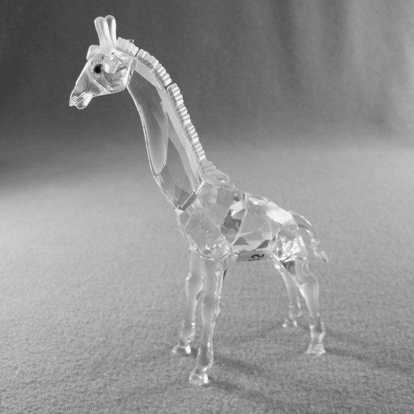 Swarovski Giraffe crystal fig.: Swarovski Giraffe crystal fig. 5 1/2" high. Shipping in USA is $ 25.00. International bidders ask before bid.
