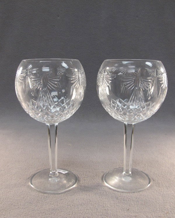 Waterford pair of crystal glasses: Waterford pair of crystal glasses, marked. 8" high. Shipping in USA is $ 40.00. International bidders ask before bid.
