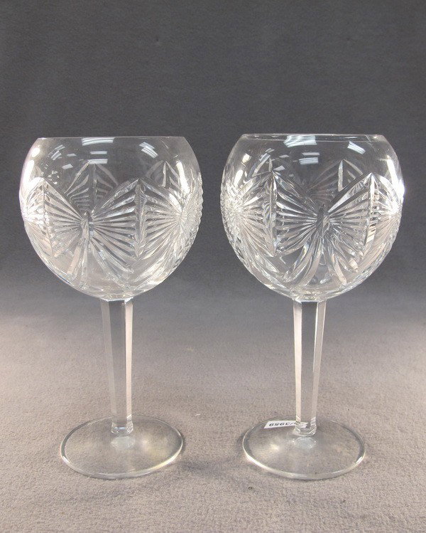 Waterford pair of crystal glasses: Waterford pair of crystal glasses, marked. 8" high. Shipping in USA is $ 40.00. International bidders ask before bid.