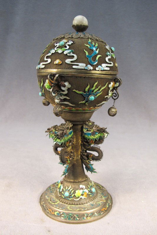 Chinese silver enamel lidded cup: Chinese silver filigree enamel and ivory lidded cup. 10 1/2" H x 4 1/4" W. Shipping in USA is $ 30.00. International bidders ask before bid.