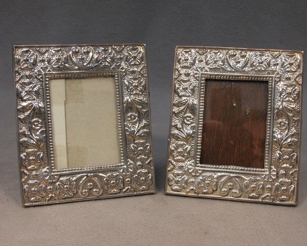 Pair of sterling 925 picture frames: Pair of sterling 925 picture frames, marked. 4 5/8" H x 4" W ( picture is 2 5/8" H x 2" W). Shipping in USA is $ 25.00.