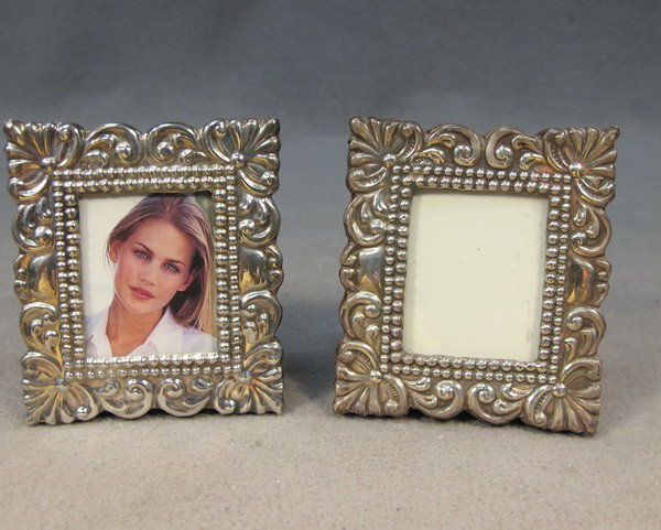 Pair of sterling 925 picture frames: Pair of sterling 925 picture frames, marked. 3" H x 2 11/16" W (picture is 1 10/16" H x 1 5/16" W). Shipping in USA is $ 25.00.
