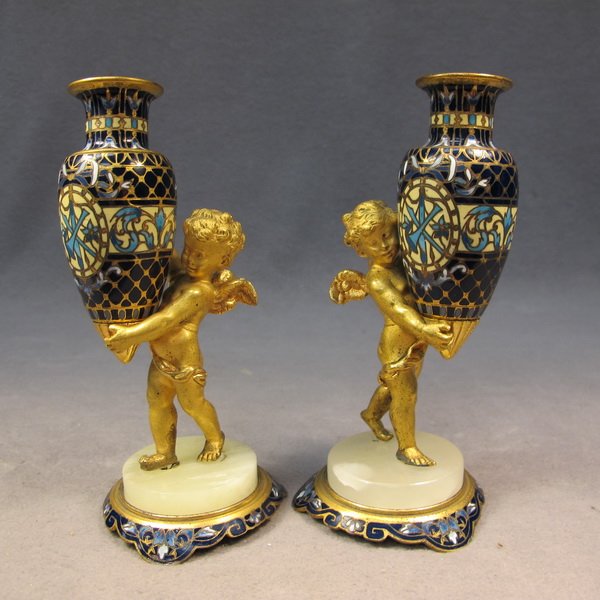 French pair of bronze champleve vases: French pair of bronze champleve vases with an onyx base. 6 3/8" H. Shipping in USA is $ 35.00. International bidder ask for shipping before bid.
