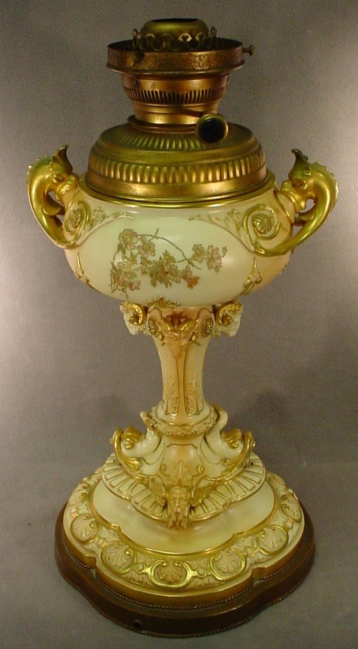 Royal Worcester rare porcelain urn lamp base: Royal Worcester rare porcelain urn transformed in an oil lamp, marked. 21" H x 10 1/4" W. Shipping in USA is $ 80.00. International bidder ask for shipping before bid.