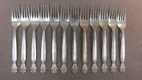 12 Georg Jensen Acanthus sterling forks: 12 Georg Jensen Acanthus pattern sterling forks, design by Johan Rohde, 1945. Weight: 576 grams or 18.51 oz Troy. 7 1/8" long. Shipping in USA is $ 35.00. International bidders ask before bid.