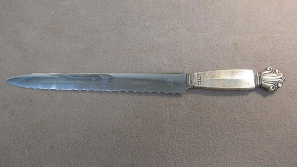 Georg Jensen Acanthus sterling bread knife: Georg Jensen Acanthus pattern sterling bread knife, design by Johan Rohde, 1945. 11 1/4" long. Shipping in USA is $ 25.00. International bidders ask before bid.