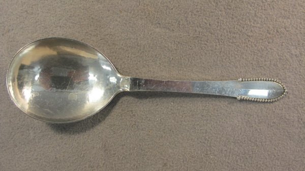 Georg Jensen Beaded pattern sterling berry spoon: Georg Jensen Beaded pattern sterling berry spoon, 1916, design by Georg Jensen. Weight: 80 grams or 2.57 oz Troy. 8 1/8" long. Shipping in USA is $ 20.00. International bidders ask before bid.