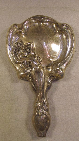 Art Nouveau sterling silver hand mirror: Art Nouveau sterling silver & beveled glass hand mirror, marked. 10" H, just the glass is 4 1/2" diameter. Shipping in USA is $ 25.00. International bidders ask before bid.