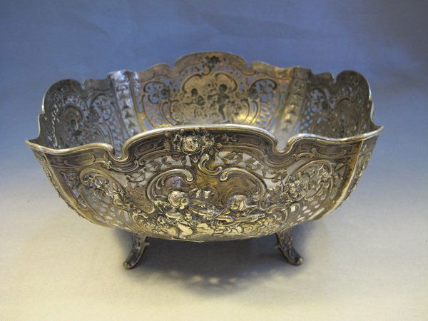 German sterling silver bowl: German sterling silver bowl, marked. Weight: 1450 grams or 46.61 oz Troy. 7" H x 12 1/4" W x 11 1/2" D. Shipping in USA is $ 45.00. International bidders ask before bid.