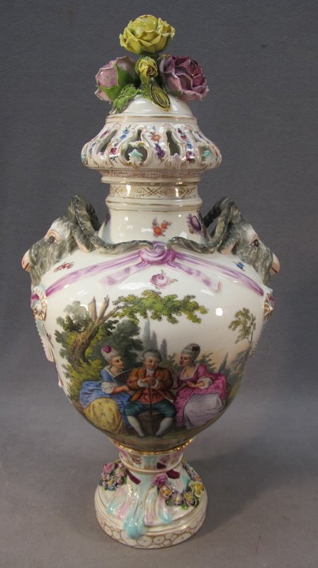 Carl Thieme Saxonian porcelain urn: German Carl Thieme Saxonian porcelain urn, marked, some chips. 24 7/8" H. Shipping in USA is $ 85.00. International bidders ask before bid.