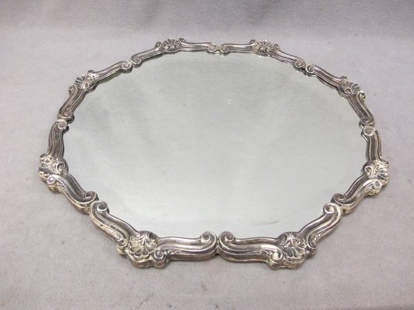 Antique sterling 925 tray from Peru: Antique sterling 925 and bevelled glass mirror tray from Peru, marked "Del Pilar 925 Peru". 15 1/4" H x 17 1/2" W. Packing & shipping in the USA is $ 45.00. International bidders ask for shipping befo
