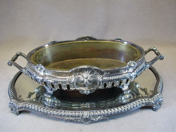 Victor SAGLIER, Saglier Frères centerpiece: Victor SAGLIER, Saglier Frères French silver-plate centerpiece with a tray, marked. Center: 4 1/2" H x 18 3/8" W x 9" D, Tray: 21" x 14". Shipping in USA is $ 75.00. International bidders ask before 