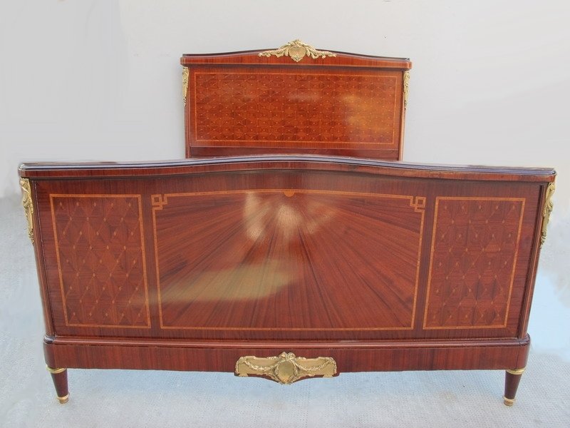 French Louis XVI inlaid ormolu full bed: French Louis XVI inlaid mahogany and rosewood ormolu full bed. 49" H x 62" W external (55" internal) x 83" D external (77" internal). Shipping in USA is $ 340.00. International bidders ask before bid.