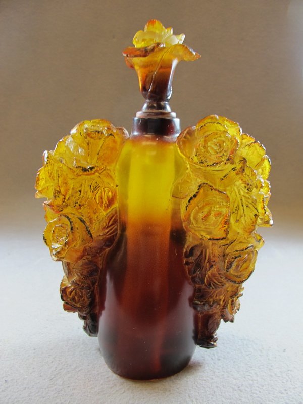 Old Chinese carved amber bottle: Old Chinese carved amber bottle. 7 3/8" H. Shipping in USA is $ 20.00. International bidders ask for shipping before bid.