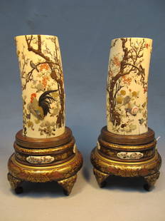 Antique Japanese pair of inlaid ivory vases: Antique Japanese pair of inlaid coral and mother of pearl ivory vases, with a wooden base. Some inlaid missing. 14" H including base and 8 1/2" H without it. Shipping in USA is $ 55.00. International