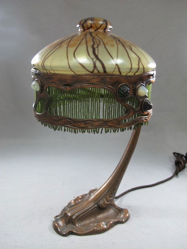 Loetz Art Nouveau glass & bronze lamp: Loetz Art Nouveau glass & bronze lamp, unsigned. 18" H. Shipping in USA is $ 55.00.International bidder ask for shipping before bid.