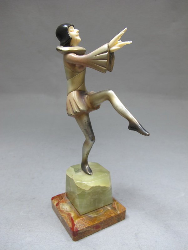 Roland PARIS (1894-1945) bronze & ivory statue: Roland PARIS (1894-1945) bronze & ivory statue with an onyx base, signed & titled: " Mephisto ". 8 1/2" H, 6 1/8" just the sculpture. Shipping in USA is $ 45.00.International bidder ask for shipping b
