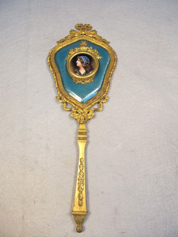 Antique enamel and bronze handle mirror: Antique enamel and bronze handle mirror, signed. 13 7/8" H x 4 7/8" W. Shipping in USA is $ 35.00. International bidders ask before bid.