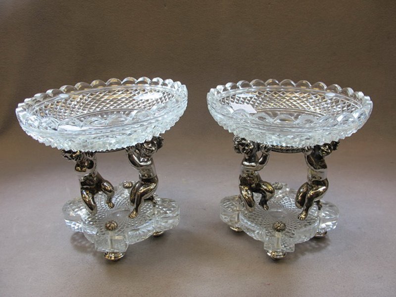 20th Century Baccarat pair of silvered bronze and: 20th Century Baccarat pair of silvered bronze and crystal centerpieces. 8 1/4" H x 7 3/4" W. Shipping in USA is $ 55.00. International bidders ask for shipping before bid.