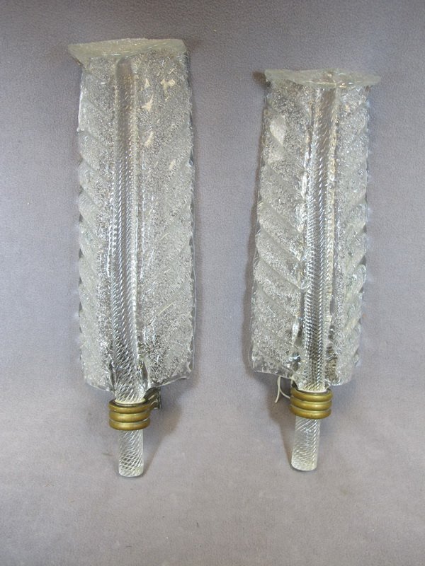 2 Art Deco glass wall sconces: 2 Art Deco glass wall sconces, similar but around 1” difference. 16 1/8" H and 17 1/4" H. Shipping in USA is $ 50.00. International bidders ask for shipping before bid.