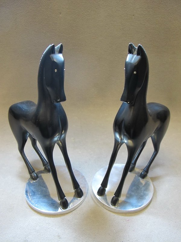 Pair of Art Deco wood statues, Hagenauer: Pair of Art Deco wood statues, marked Hagenauer, Austria. 11 3/4" H. Shipping in USA is $ 50.00. International bidders ask for shipping before bid.