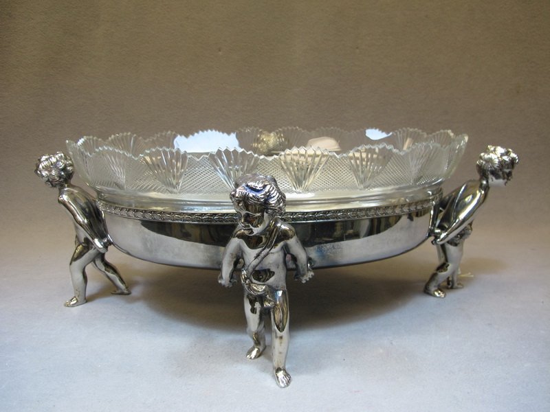 Silver-plate bronze & glass centerpiece: Silver-plate bronze & glass centerpiece. 7 1/2“ H x 20 1/2” W. Shipping in USA is $ 50.00. International bidders ask before bid.