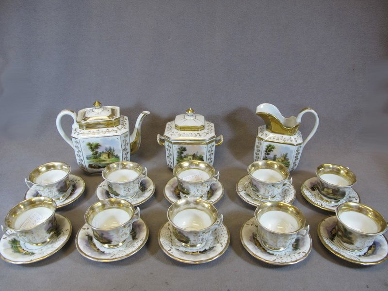 Probably german antique porcelain teapot set: Probably german antique porcelain teapot set for 10. Teapot: 8" H, Cup: 2 1/2” H, Plate: 5 1/2” diameter. Shipping in USA is $ 60.00. International bidders ask for shipping before bid.