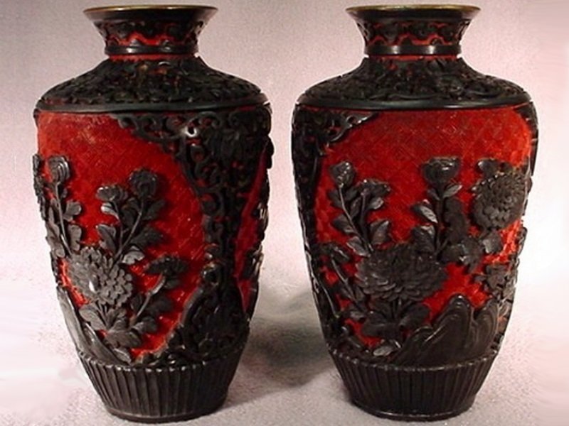 Pair of Chinese carved cinnabar vases: Pair of Chinese carved cinnabar vases. 6 1/2"H. Shipping in USA is $ 45.00, International bidders ask before bid.
