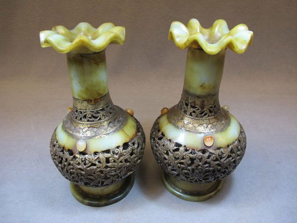 Chinese pair of bronze & alabaster vases: Chinese pair of bronze & alabaster vases, some stones attached. 9 1/2" H. Shipping in USA is $ 35.00. International bidders ask for shipping before bid.