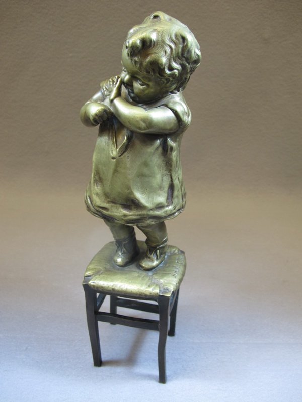 Juan CLARA AYATS (1875 - 1958) bronze statue: Juan CLARA AYATS (1875 - 1958) bronze statue, signed and titled: “ A Timid Child standing on a Chair”. 13" H. Shipping in USA is $ 40.00 plus insurance. International bidders ask for shipping befo