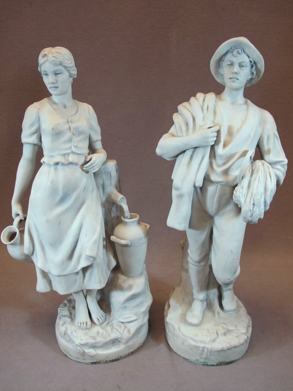 Royal Dux pair of porcelain statues: Royal Dux, Czechoeslovakia pair of porcelain statues, marked. 21 1/4" H. Shipping in USA is $ 110.00. International bidders ask before bid.