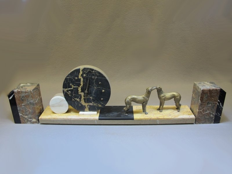 Art Deco spelter and marble garniture: Art Deco spelter and marble garniture. 10” H x 26” W. Shipping in USA is $ 75.00. International bidders ask before bid.