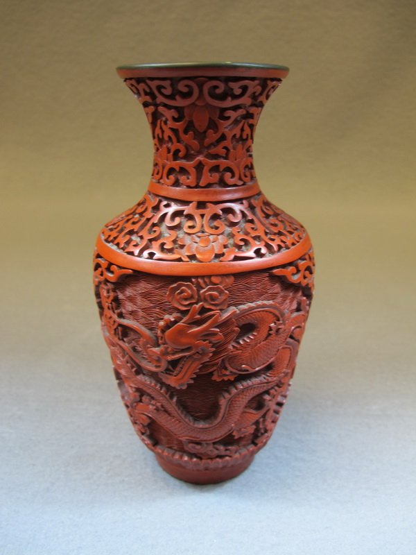 Chinese cinnabar vase: Chinese cinnabar vase. 6 1/2” H. Shipping in USA is $ 35.00. International bidders ask for shipping before bid.