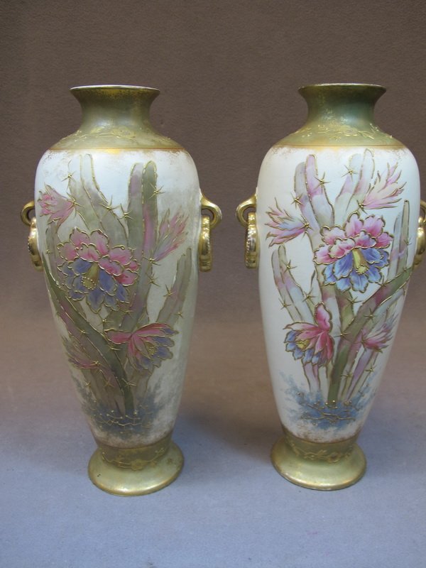 Royal Bonn pair of porcelain vases: Royal Bonn pair of porcelain vases, signed. 13” H. Shipping in USA is $ 55.00. International bidders ask for shipping before bid.