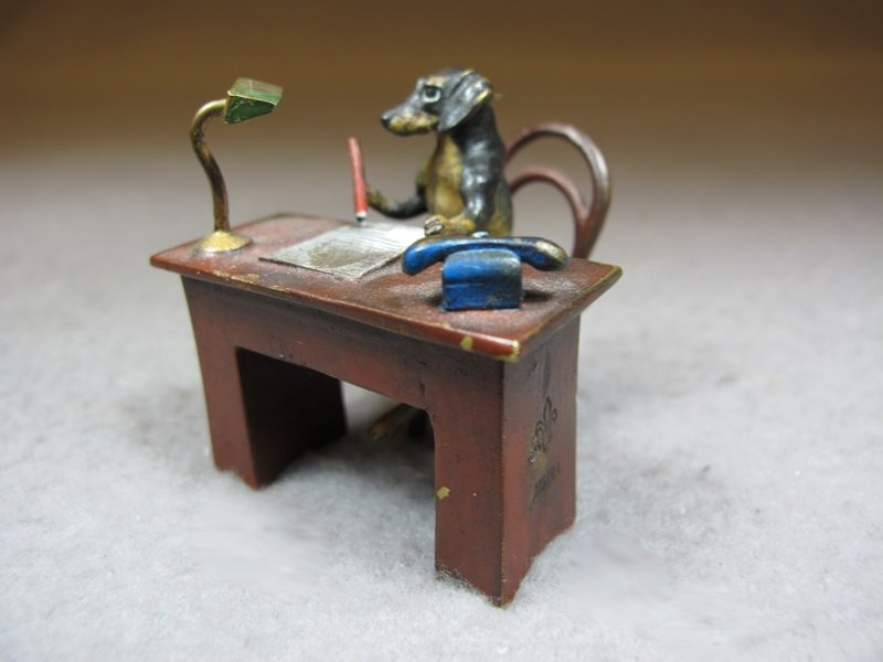 Franz BERGMAN (1898-1963) Vienna bronze dog writing scu: Franz BERGMAN (1898-1963) Vienna bronze dog writing sculpture, original painting, marked. 1 5/8” H x 1 5/8” W x 1 5/8” D. Shipping in USA is $ 10.00 plus insurance. International bidders ask for