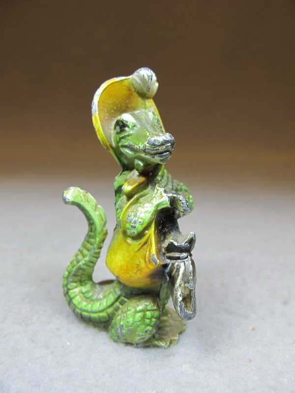 Vienna bronze lady crocodile sculpture: Vienna bronze lady crocodile sculpture, original painting and made in lead. 2 3/4” H. Shipping in USA is $ 10.00 plus insurance. International bidders ask for shipping before bid.