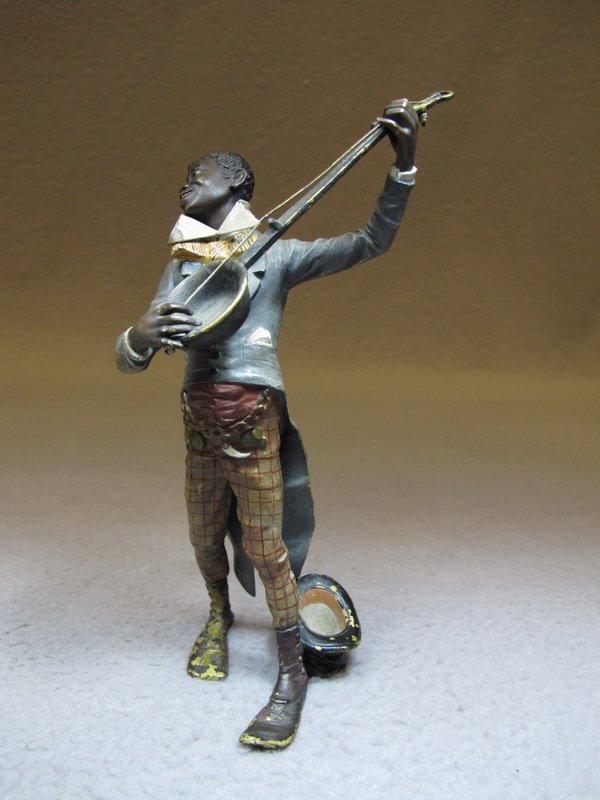 Franz BERGMAN (1898-1963) Vienna bronze black man playi: Franz BERGMAN (1898-1963) Vienna bronze black man playing banjo sculpture, marked, original painting. 7” H. Shipping in USA is $ 20.00 plus insurance. International bidders ask for shipping before b