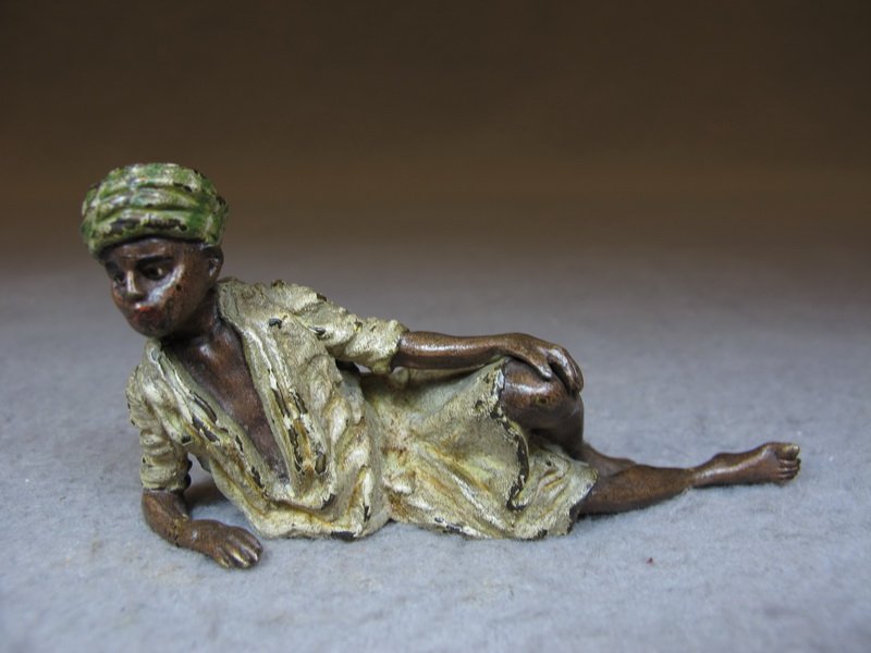 Franz BERGMAN (1898-1963) Vienna bronze Orientalist scu: Franz BERGMAN (1898-1963) Vienna bronze Orientalist boy sculpture, marked, original painting. 1 5/8” H x 3” W. Shipping in USA is $ 10.00 plus insurance. International bidders ask for shipping bef