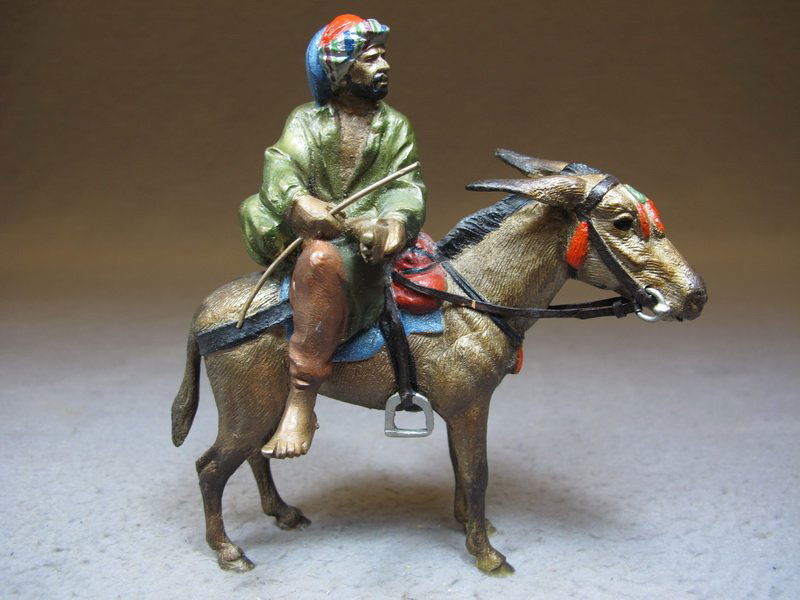 Vienna bronze Orientalist man & dunkey sculpture: Vienna bronze Orientalist man & dunkey sculpture, original painting. 5” H x 4 1/2” W. Shipping in USA is $ 10.00 plus insurance. International bidders ask for shipping before bid.