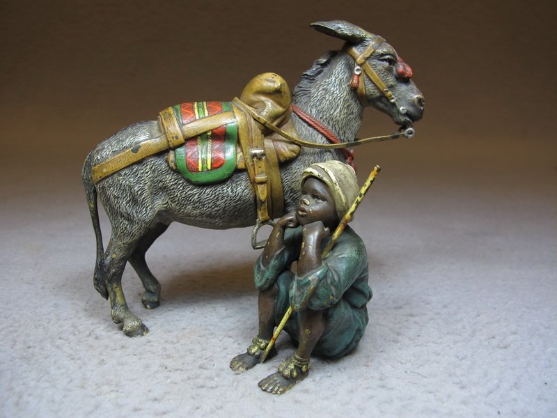 Franz BERGMAN (1898-1963) Vienna bronze boy & dunkey sc: Franz BERGMAN (1898-1963) Vienna bronze boy & dunkey sculpture, signed, original painting. 4 3/8” H x 5” W. Shipping in USA is $ 10.00 plus insurance. International bidders ask for shipping before