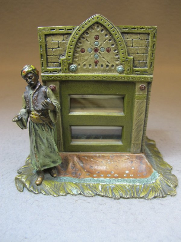 Vienna bronze Orientalist man & panel sculpture: Vienna bronze Orientalist man & panel sculpture, original painting. 4 7/8” H x 4 7/8” W x 4” D. Shipping in USA is $ 10.00 plus insurance. International bidders ask for shipping before bid.