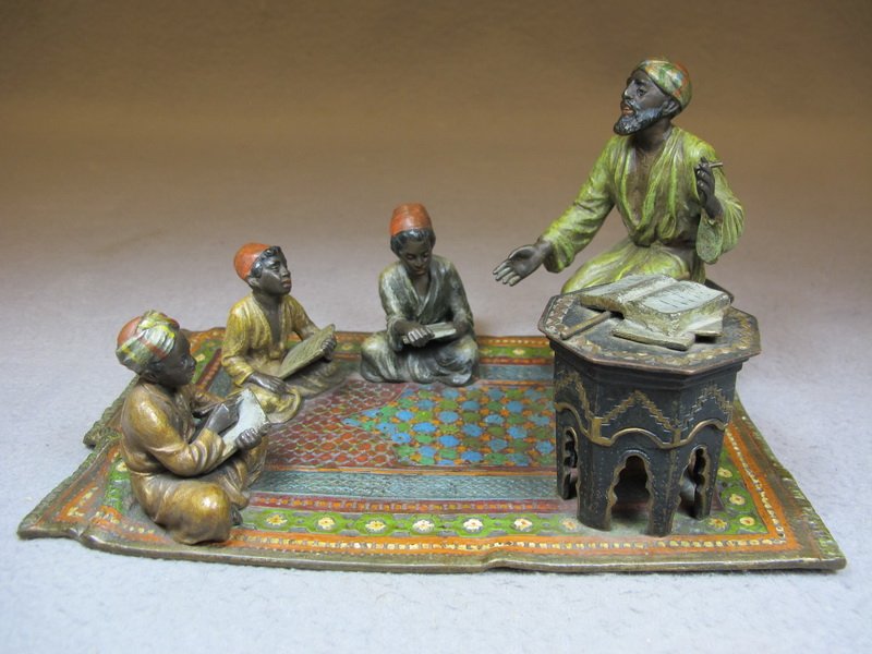 Vienna bronze Orientalist man & boys reading sculpture: Vienna bronze Orientalist man & boys reading sculpture, original painting. 4 1/2” H x 8” W x 4 7/8” D. Shipping in USA is $ 15.00 plus insurance. International bidders ask for shipping before bi