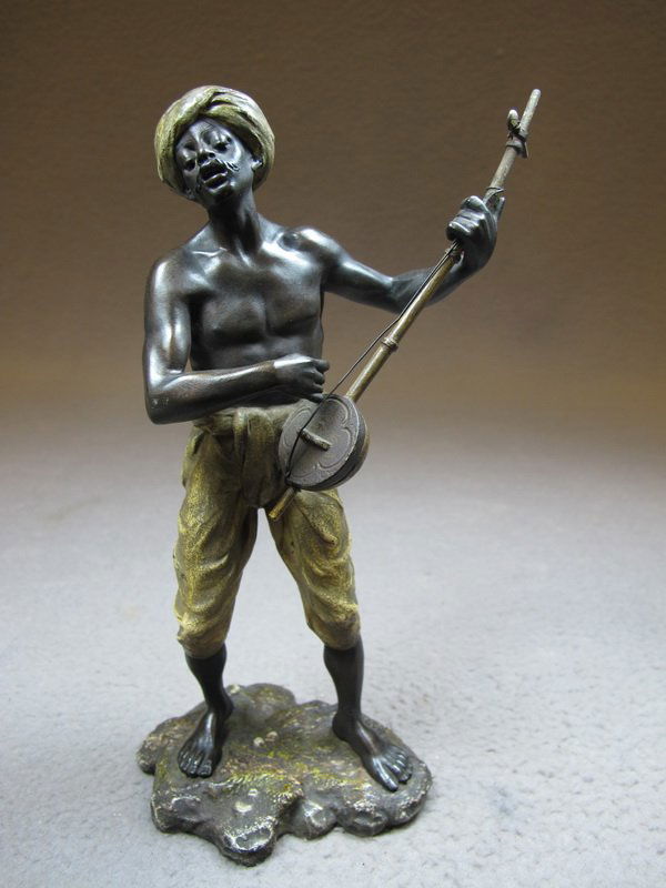Franz BERGMAN (1898-1963) Vienna bronze man playing scu: Franz BERGMAN (1898-1963) Vienna bronze man playing sculpture, signed, original painting. 8 1/2” H. Shipping in USA is $ 10.00 plus insurance. International bidders ask for shipping before bid.